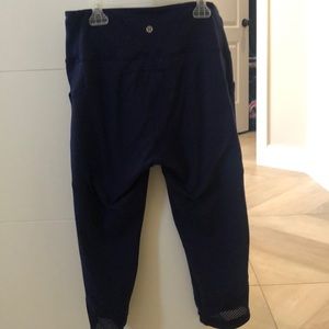 Size 10 Lululemon navy blue cropped leggings.